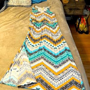 Women’s size xl summer dress. Only wore twice. Has a small slit on each side.